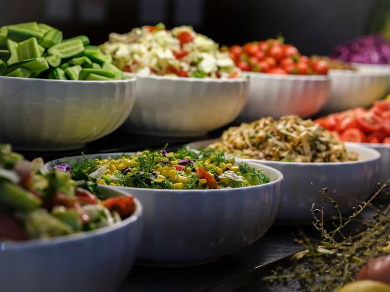 Bowls of prepared food ready for a corporate working lunch